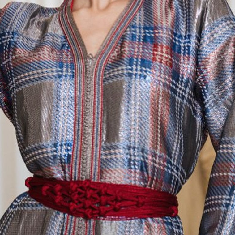 Silver tartan one-piece Moroccan caftan with a hand-worked braid down the placket and a red velvet belt