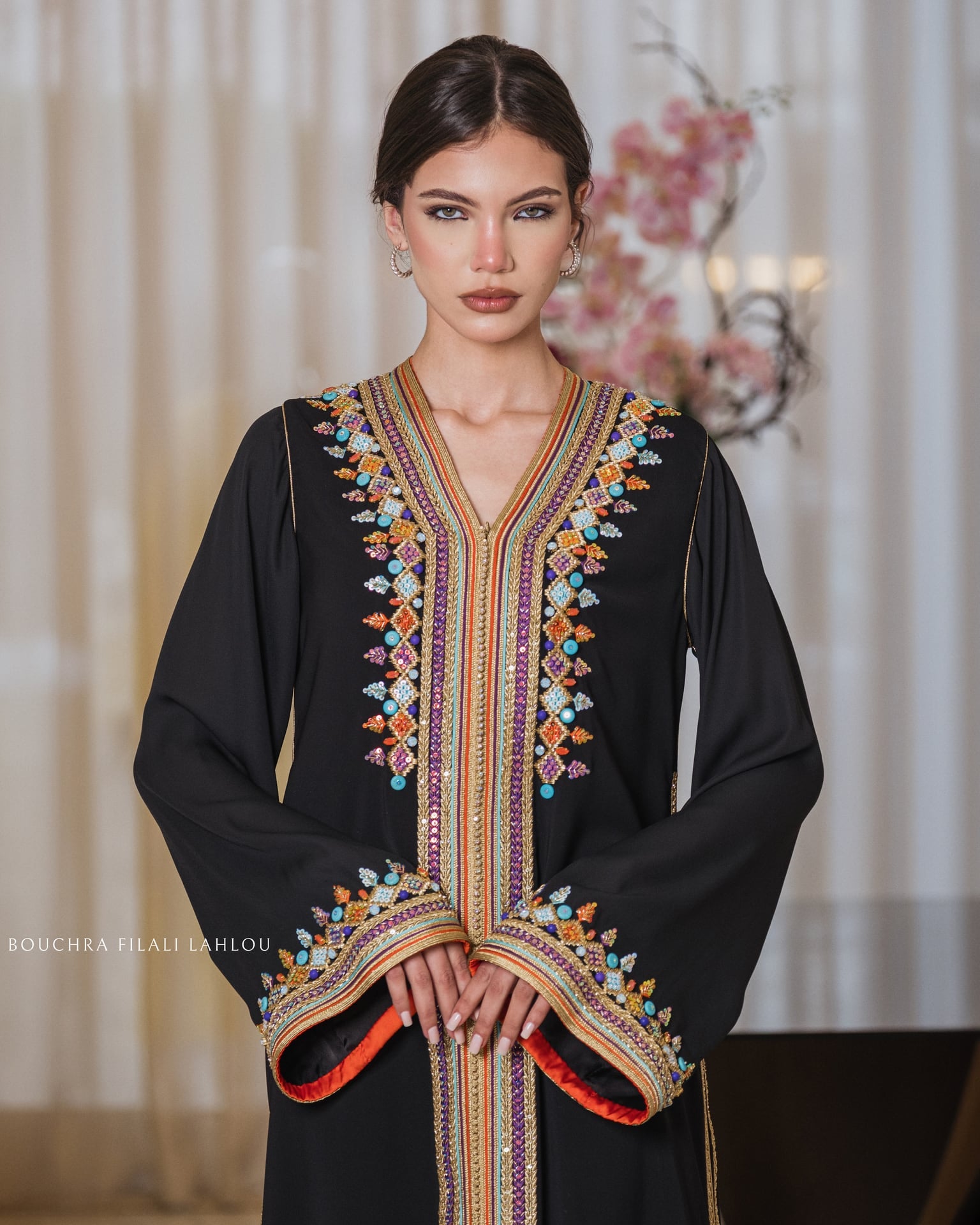 Ink Garden one-piece Moroccan caftan in black with polychrome hand embroidery, full-length front view