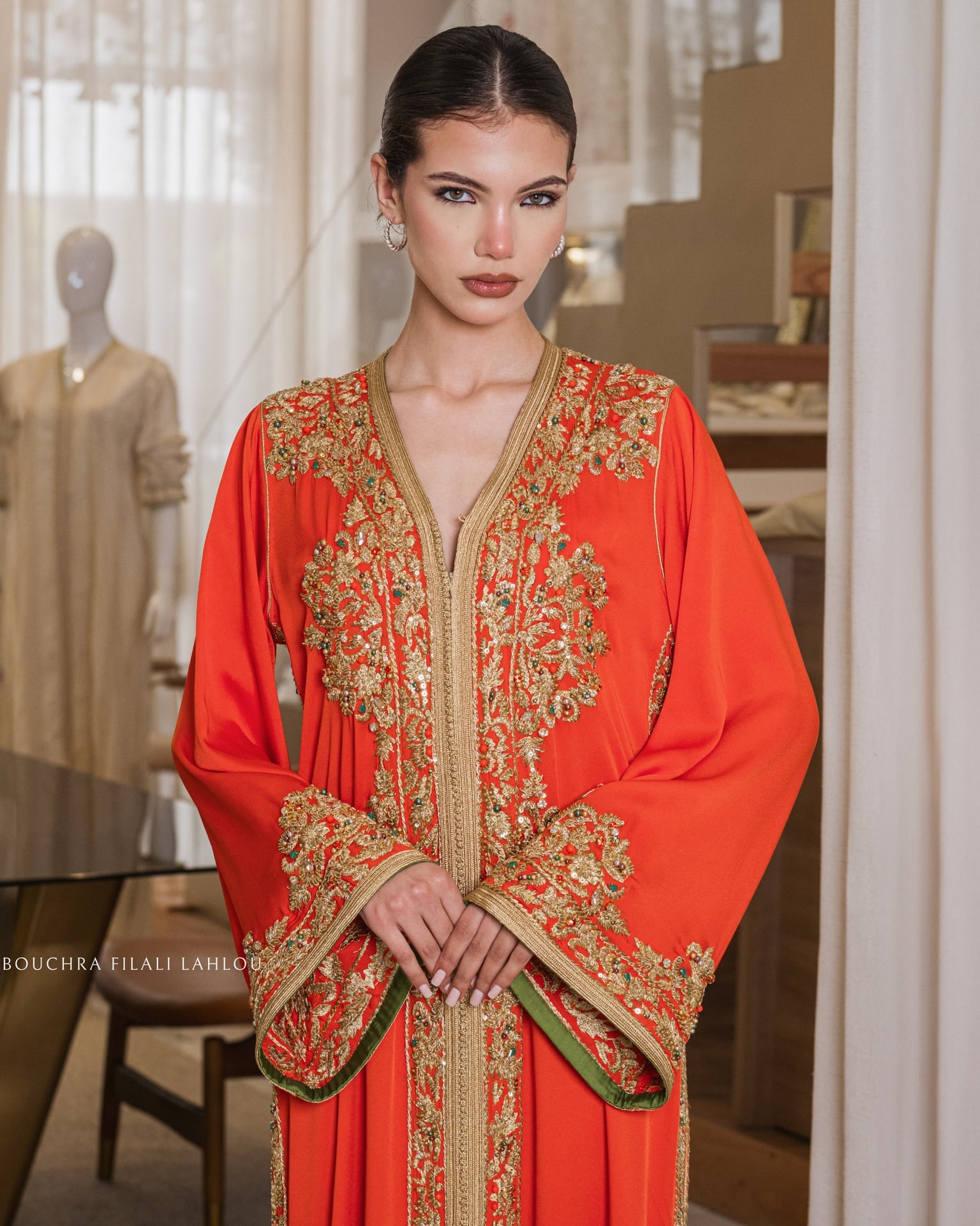 Marigold Ember one-piece Moroccan caftan with dense gold embroidery on the placket, full-length front view