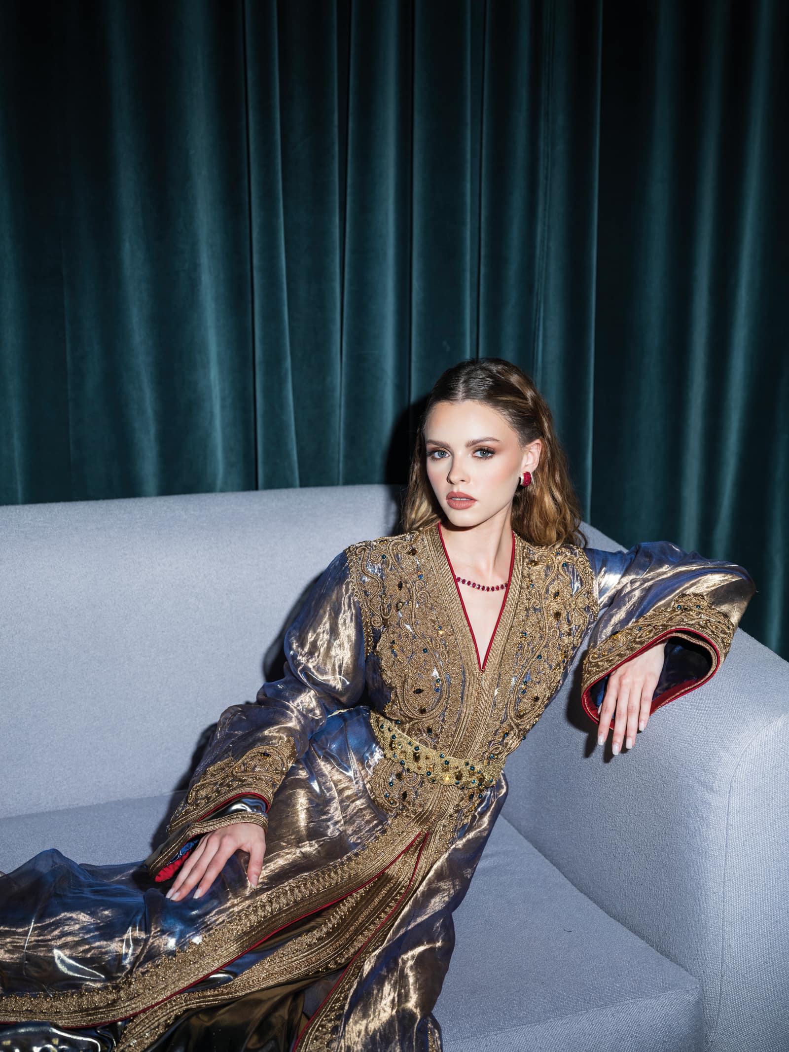 Blue gold Moroccan kaftan with metallic fabric and ornate embroidery detail