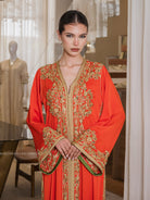Marigold Ember one-piece Moroccan caftan with dense gold embroidery on the placket, full-length front view